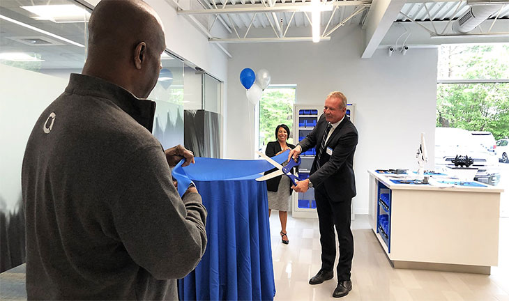 Boston office ribbon cutting